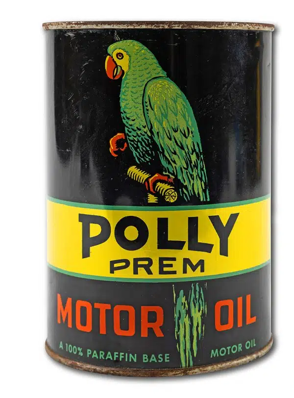 Винтажная банка моторного масла Polly Prem с изображением зеленого попугая на черном фоне и желтой этикеткой.
