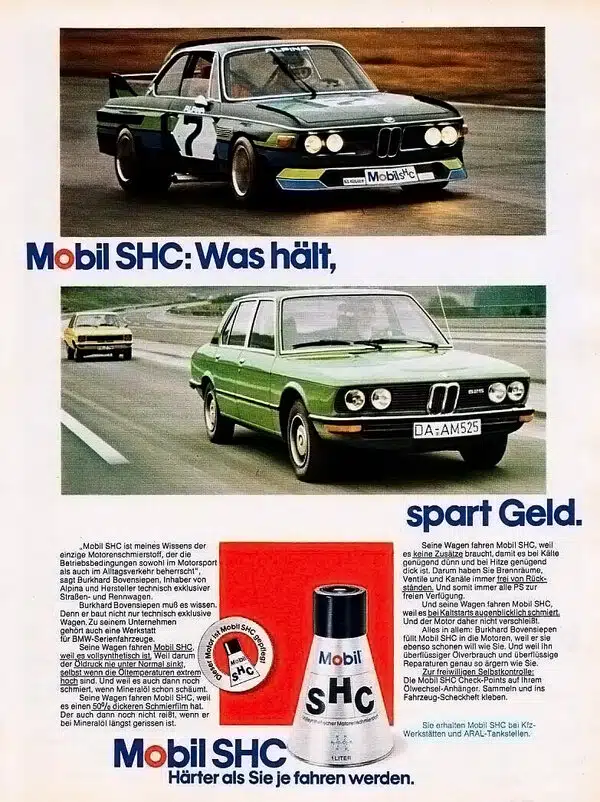 BMW гоночный и дорожный автомобиль на фоне рекламы масла Mobil SHC