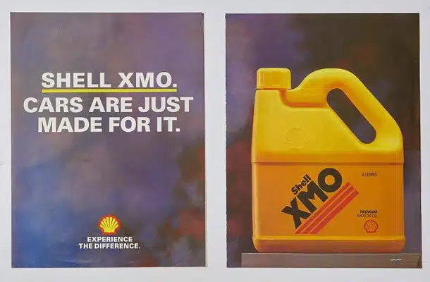 Два плаката рекламы моторного масла Shell XMO с слоганом "Машины созданы для этого" и изображением желтой канистры масла.