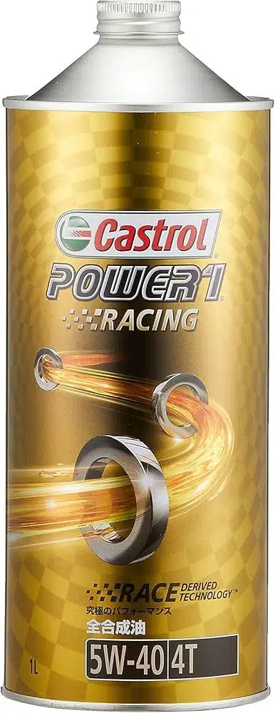 Металлическая банка моторного масла Castrol Power1 Racing 5W-40 4T золотистого цвета с изображением колец и светящихся линий.