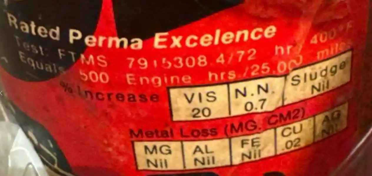 Красная этикетка с техническими данными о продукте Perma Excellence