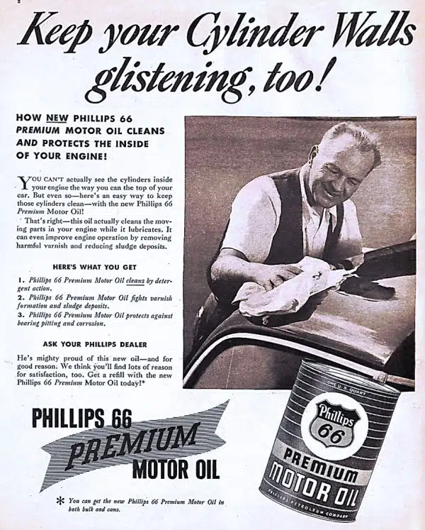 Винтажная реклама Phillips 66 Premium Motor Oil с улыбающимся мужчиной, полирующим авто и банкой масла.