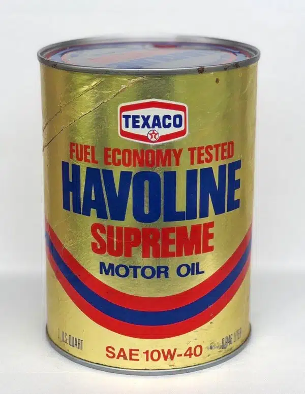 Винтажная золотистая банка моторного масла Texaco Havoline Supreme с красными и синими полосами.